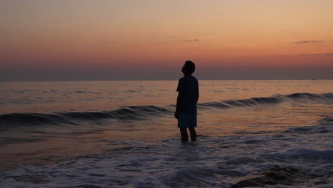 depressed man on beach during sunset