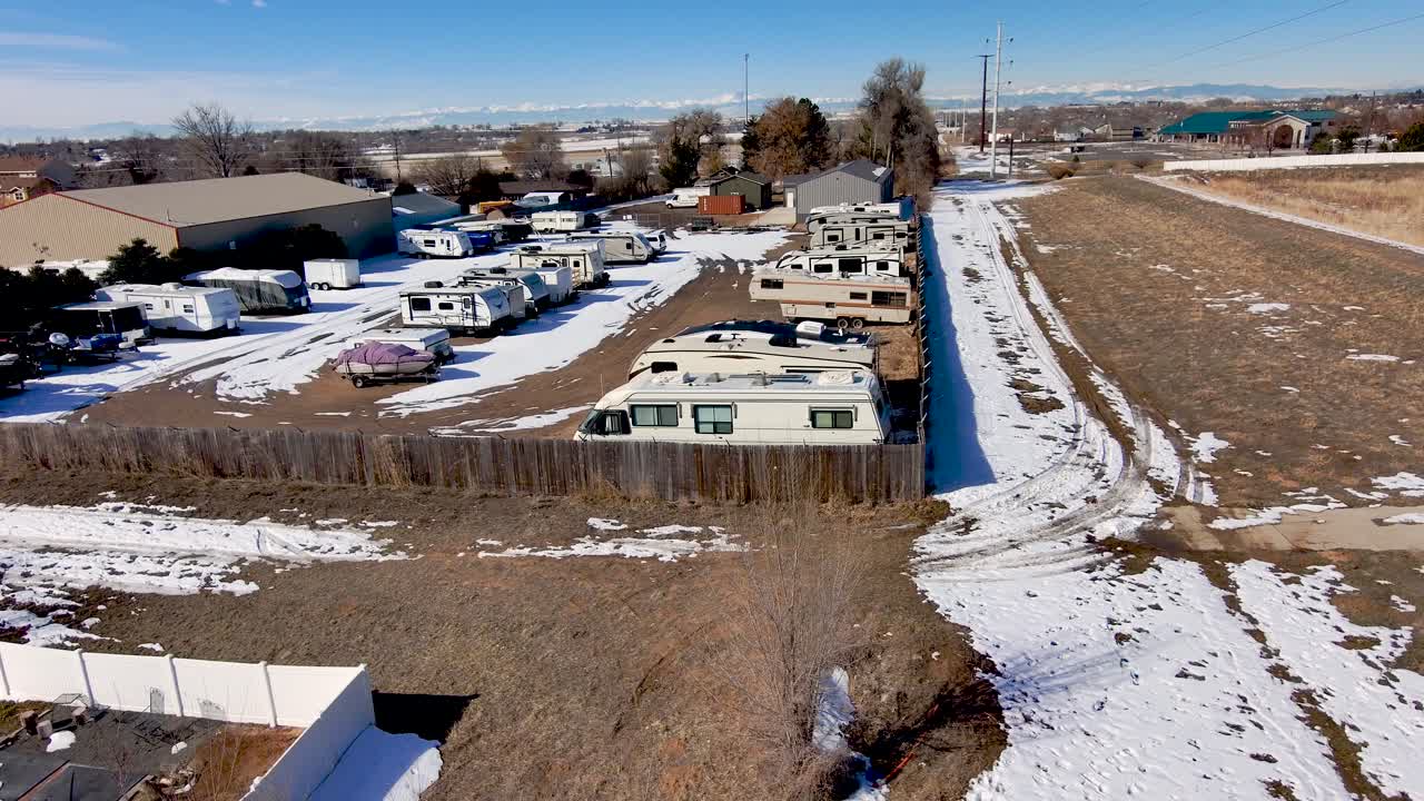 Winter RV storage facility taken from a drone. 4k .