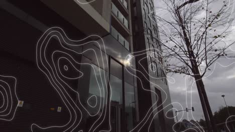 composición digital de la topografía contra edificios altos en el fondo