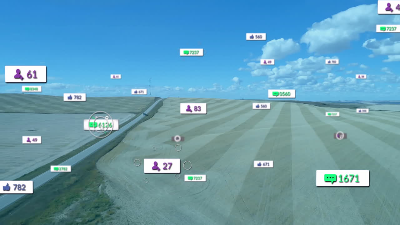 Social media metrics being animated over aerial farmland, with floating chat like follower badges