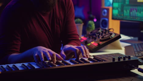 Audio engineer recording piano keyboard instrument notes and vocals