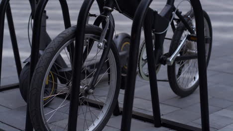 closeup electric scooter bicycle standing on shared parking lot. city mobility