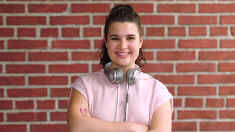 portrait of a sporty young woman against a red