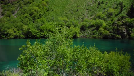 small mountain lake of blue color urungach