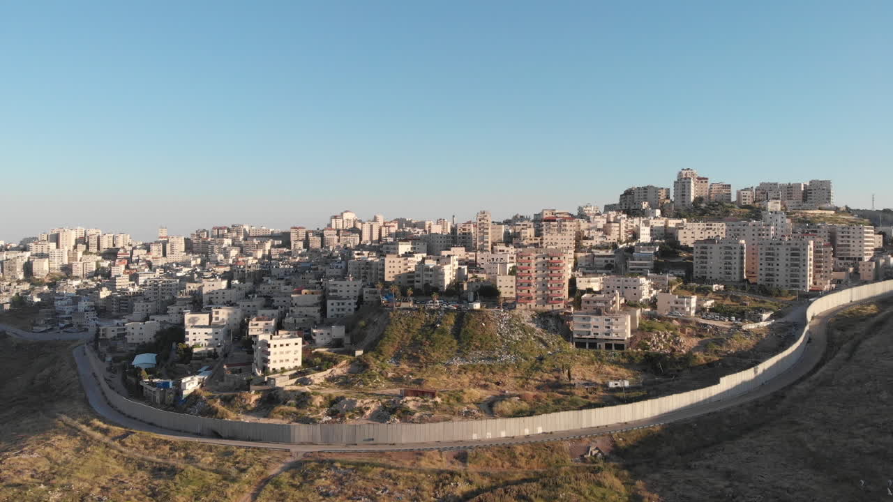 Israel wall fence in Jerusalem aerial view
