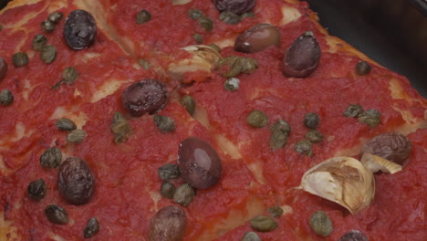 pizza sardenaira typical italian food, sardinara liguria traditional gourmet, olives, tomato, garlic handmade ligurian mediterranean gourmet