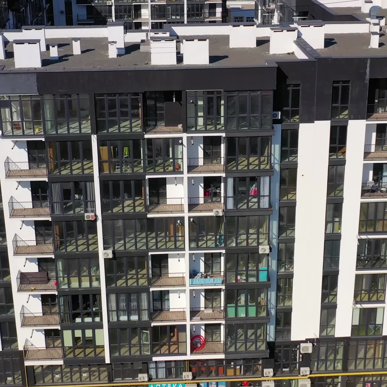 Aerial view of residentail community. Exterior of high rise multi story apartment building