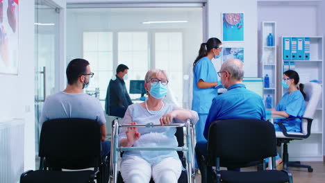 disabled senior woman with walking frame