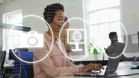 animation of data processing and icons over diverse business people using phone headset in office