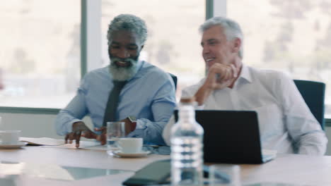 corporate business people brainstorming in boardroom meeting discussing strategy colleagues sharing ideas working on deadline collaborating in office 4k
