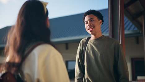 students chatting on campus