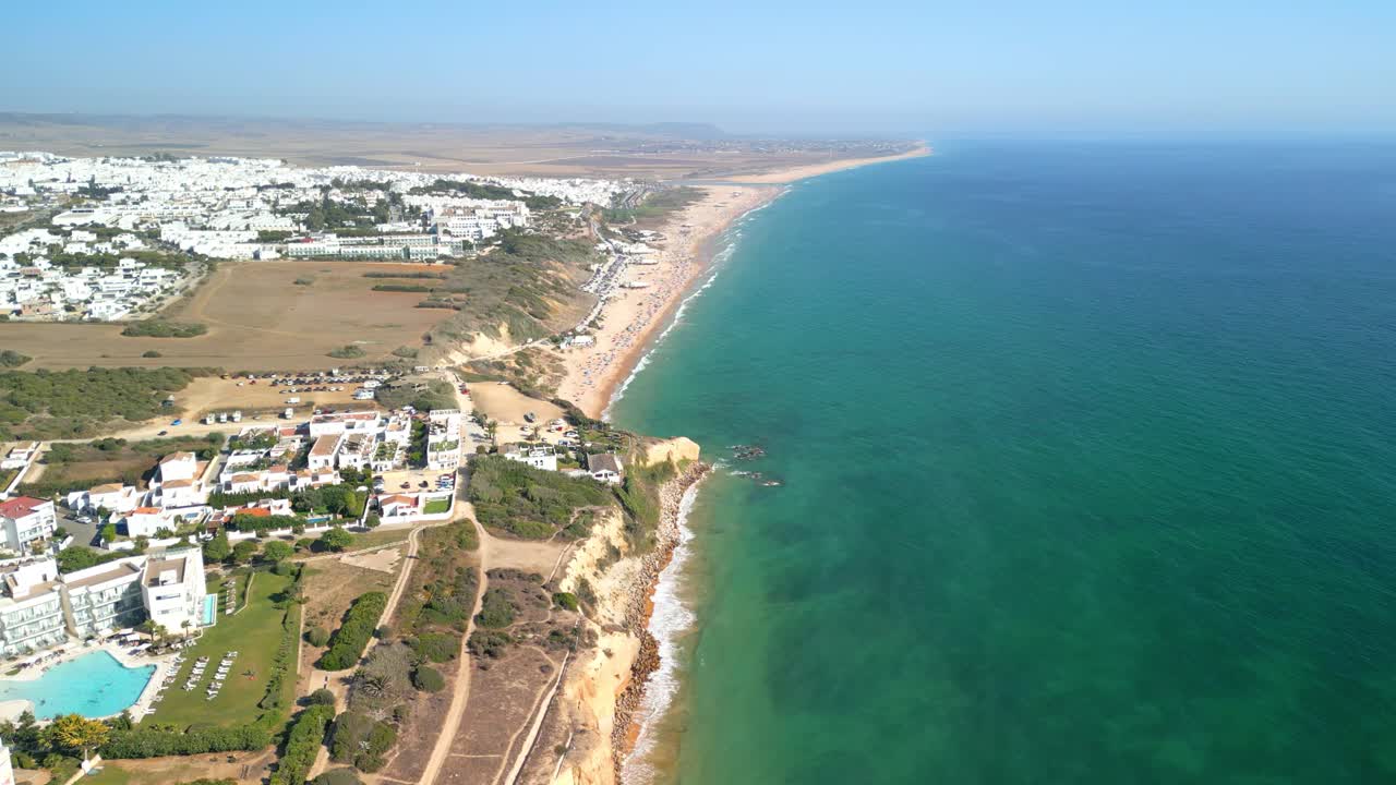 Aerial Panorama of the Sandy Shores and Clear Waters of Conil de la Frontera
