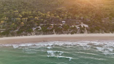 campground seafront at sunset, coles bay in tasmania, australia