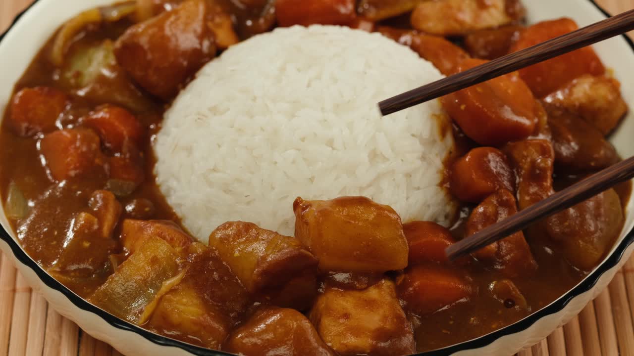 Japanese curry rice with fry pork Tonkatsu, Katsu Kare, Japanese breaded cooking dinner in restaurant, close up macro of asian food