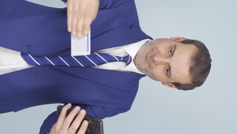 Vertical-video-of-Businessman-shopping-with-credit-card.