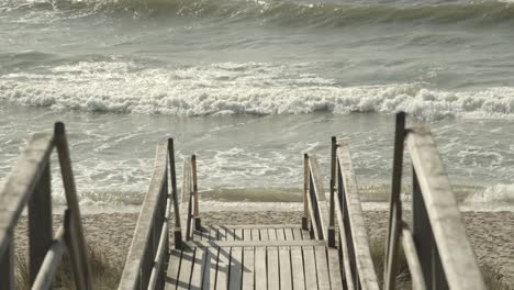 boardwalk to the beach of sylt with the northsea in the background 4k 60fps