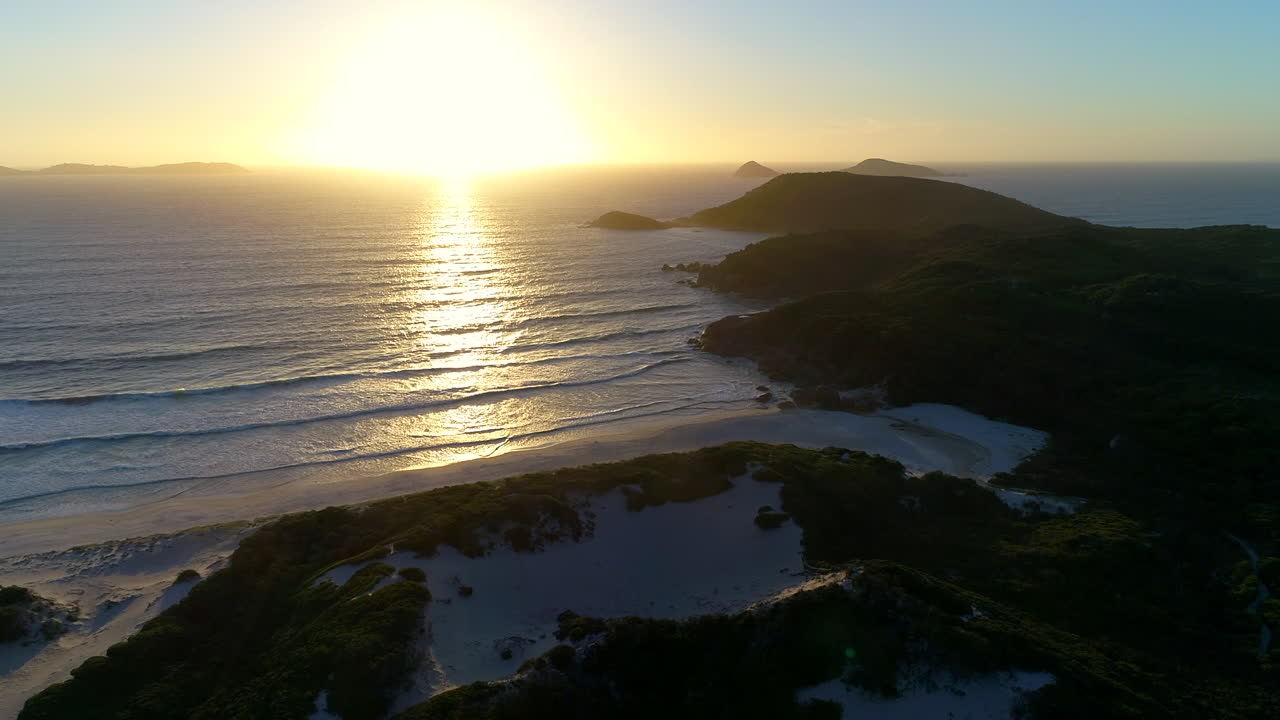 impresionante puesta de sol en la playa, chirriante playa wilsons prom