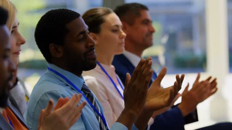 Business-people-applauding-a-speech-in-the-business-seminar-4k