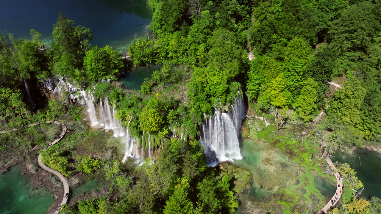 Plitvice Lakes National Park Waterfalls And Green Forest In Summer In Croatia. - aerial shot