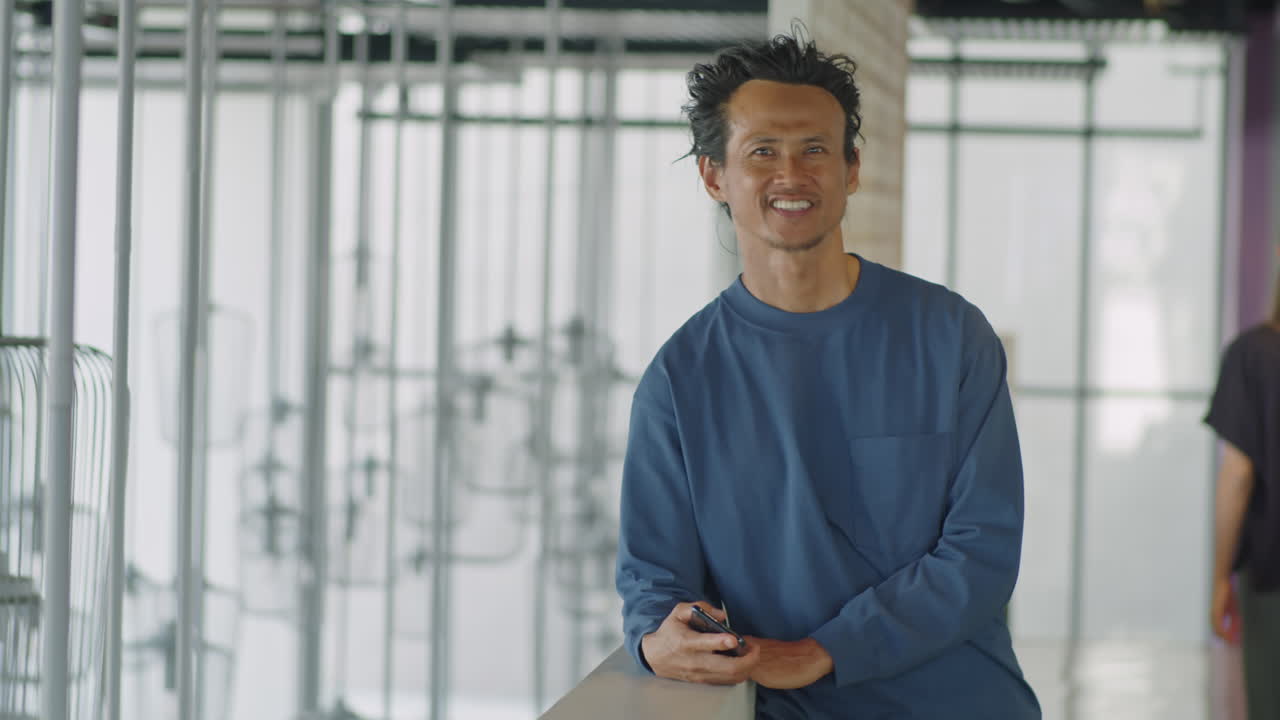 Portrait of Happy Asian Man in Office Center