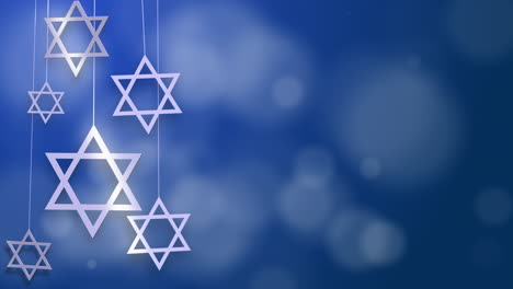 white jewish stars of david spin on thin threads. blue abstract animated background with hexagonal stars symbols of israel.