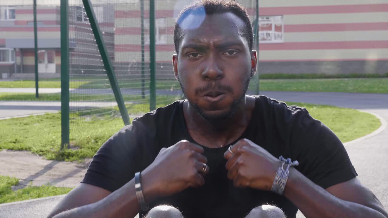 Man doing crunches outdoors