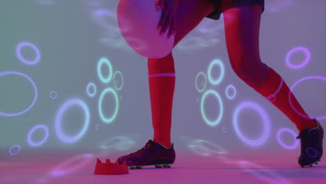 animación de un patrón de neón sobre una jugadora de rugby en un fondo de neón