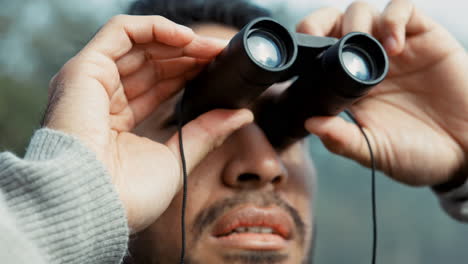 face, hiking and binoculars with a man in nature