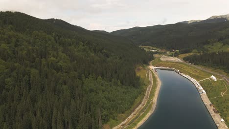 Aerial-shot-of-lake-in-Ukrainian-valley