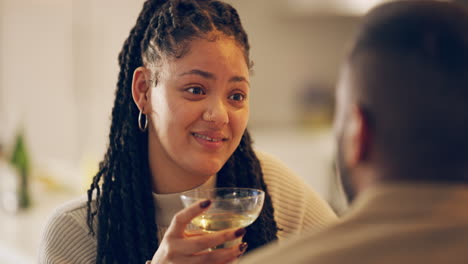 a-young-couple-having-drinks-at-a-bar