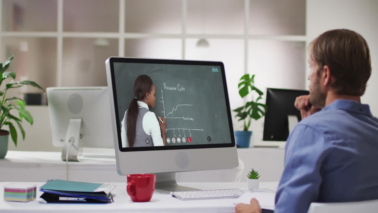 Caucasian male student using computer on video call with female teacher