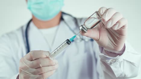 doctor preparing vaccine injection