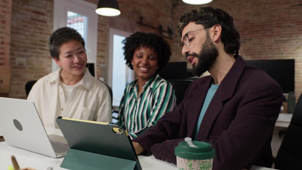 Group of coworkers collaborating in a modern office space