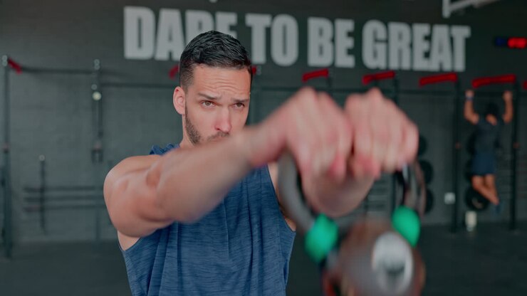 Man, gym and kettlebell workout for muscle