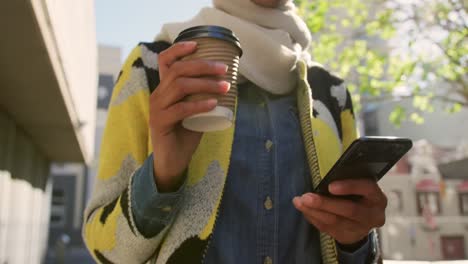 young woman wearing hijab out and about in the city