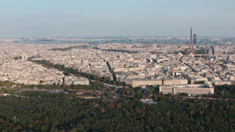 slider drone shot of west paris eiffel tower and arc de triomphe