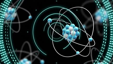 animación del giro del modelo atómico y procesamiento de datos sobre fondo negro