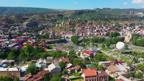 aerial shot over tbilisi, georgia's capital city centre