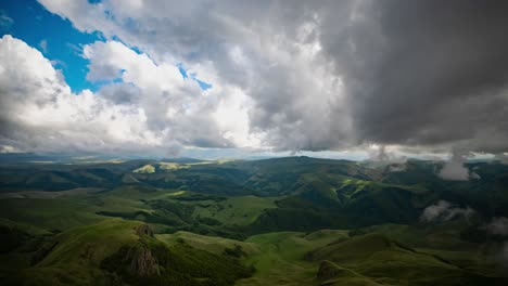 Low-clouds-over-a-highland-plateau-in-the-rays-of-sunset.-Sunset-on-Bermamyt-plateau-North-Caucasus,-Karachay-Cherkessia,-Russia.