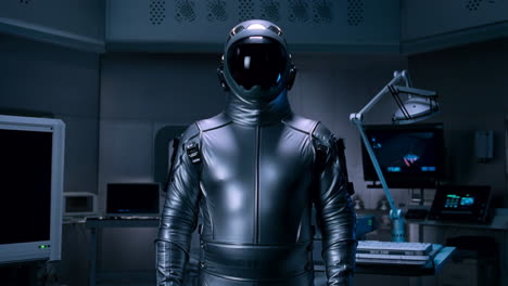 astronaut in a futuristic space suit in a control room