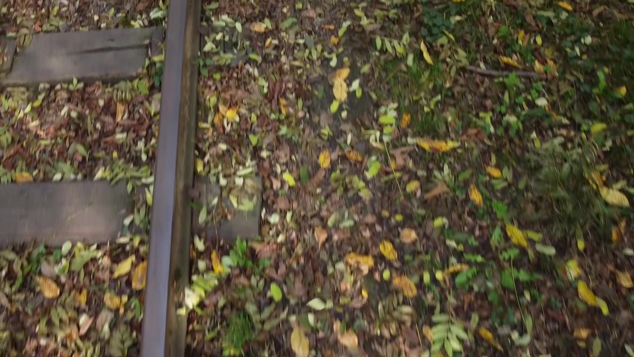 Narrow-gauge railway. Railway road. Rails and railroad tie.