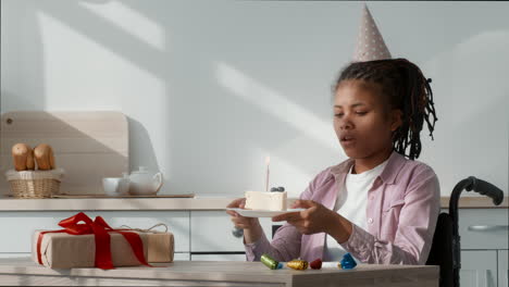 young girl in wheelchair celebrating birthday