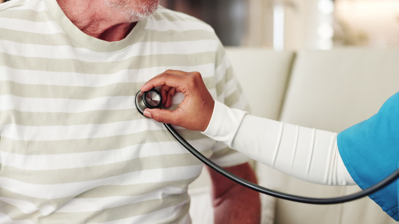 Medical Professional Examining Senior Man's Chest with Stethoscope