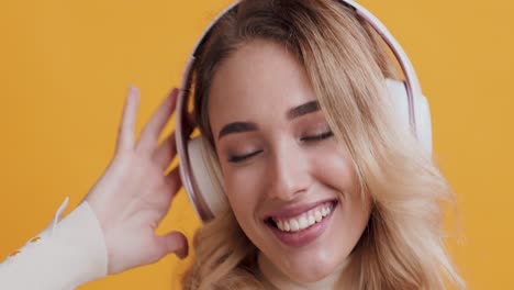 woman listening to music with headphones