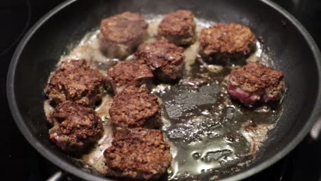 cook meatballs in frying pan