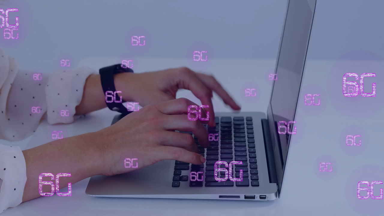 Typing on laptop, hands displaying 6G technology animation in school setting