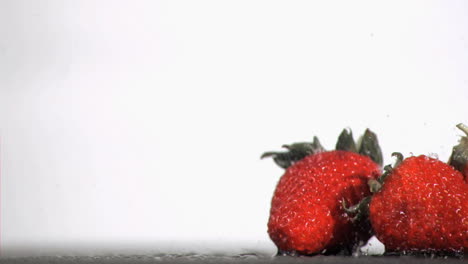 raindrops falling in super slow motion on fruits