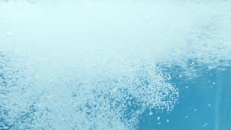 the carbonated water is filled with sugar, blue background