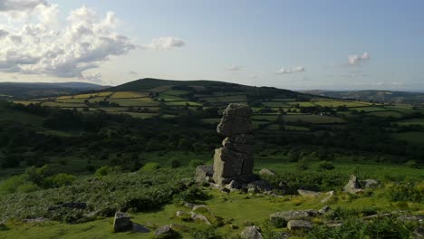 An-aerial-drone-shot-of-Bowerman's-Nose-Rock-Formation-at-Dartmoor-National-Park,-Devon