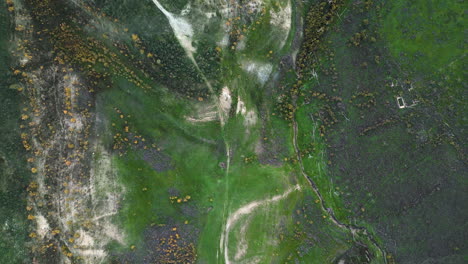 foothills next to the zahara de la sierra in spain. aerial drone green landscape.
